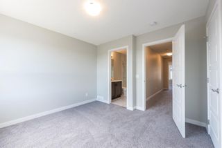 Photo 21: 123 301 REDSTONE Boulevard in Calgary: Redstone Row/Townhouse for sale : MLS®# A1246264