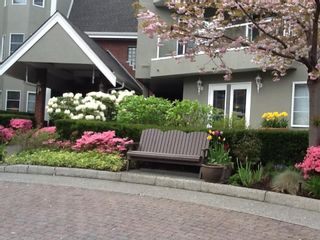Photo 1: 205 2020 CEDAR VILLAGE Crescent in North Vancouver: Westlynn Condo for sale in "Kirkstone Gardens" : MLS®# R2281750