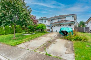 Photo 1: 8878 141A Street in Surrey: Bear Creek Green Timbers House for sale : MLS®# R2710557