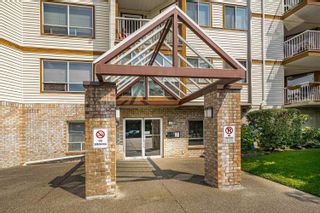 Photo 1: 313 5710 201 Street in Langley: Langley City Condo for sale in "White Oaks" : MLS®# R2698526
