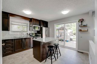 Photo 7: 48 Millbank Road SW in Calgary: Millrise Detached for sale : MLS®# A2051245