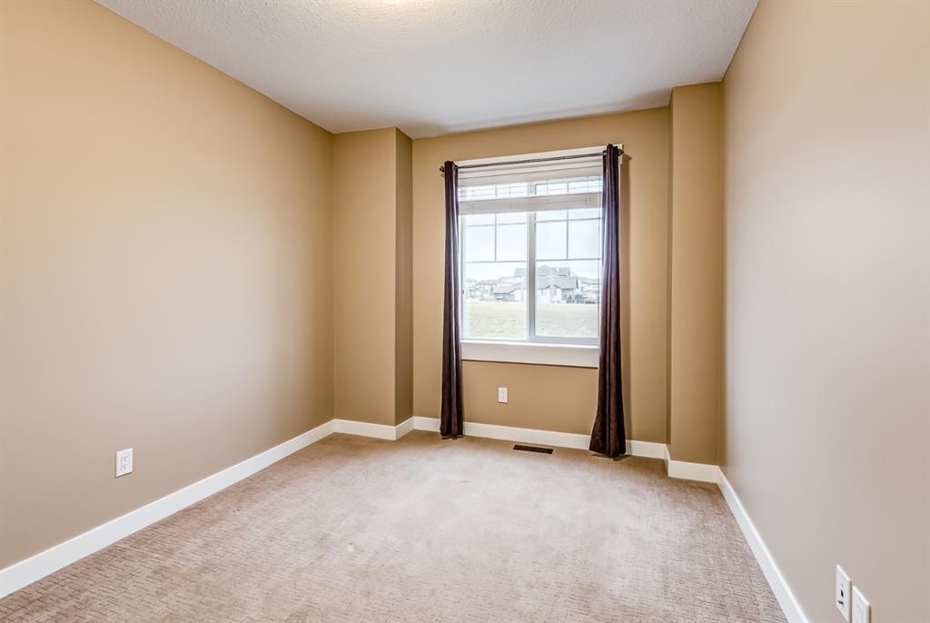Photo 35: Photos: 228 Rainbow Falls Green: Chestermere Semi Detached for sale : MLS®# A1158715
