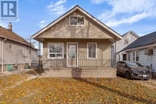 Photo 1: 1110 MCKAY AVENUE in Windsor: House for sale : MLS®# 23023427