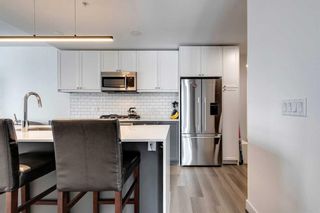 Photo 3: 602 327 9A Street NW in Calgary: Sunnyside Apartment for sale : MLS®# A2109898