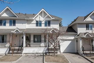 Photo 1: 209 950 Arbour Lake Road NW in Calgary: Arbour Lake Row/Townhouse for sale : MLS®# A1096057