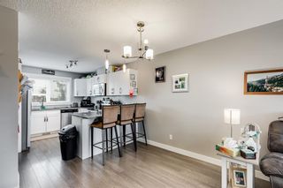 Photo 4: 103 2461 Baysprings Link SW: Airdrie Row/Townhouse for sale : MLS®# A2030803