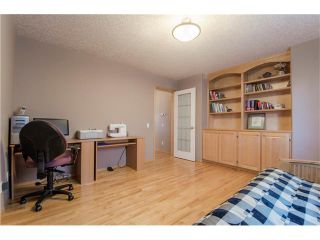 Photo 17: 69 STRATHLEA Place SW in Calgary: Strathcona Park House for sale : MLS®# C4101174