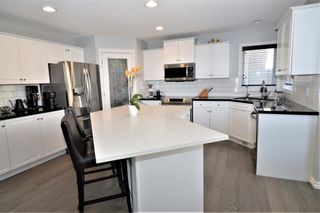 Photo 3: 7476 Springbank Way SW in Calgary: Springbank Hill Detached for sale : MLS®# A1071854