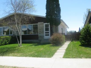 Photo 1: 210 Tu-pelo Avenue in WINNIPEG: East Kildonan Single Family Attached for sale (North East Winnipeg)  : MLS®# 1310231