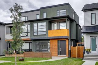 Photo 1: 2312 23 Avenue SW in Calgary: Richmond Semi Detached (Half Duplex) for sale : MLS®# A2079353