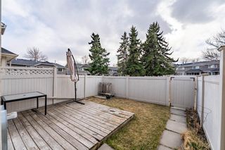 Photo 26: 321 Queenston Heights SE in Calgary: Queensland Row/Townhouse for sale : MLS®# A1201430