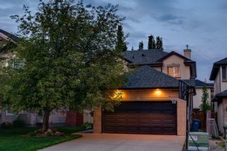 Photo 1: 59 Strathridge Grove SW in Calgary: Strathcona Park Detached for sale : MLS®# A2051678