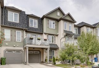 Photo 1: 108 Windstone Mews SW: Airdrie Row/Townhouse for sale : MLS®# A1142161