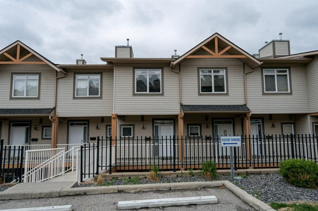Main Photo: 12 153 Rockyledge View NW in Calgary: Rocky Ridge Row/Townhouse for sale : MLS®# A1231919