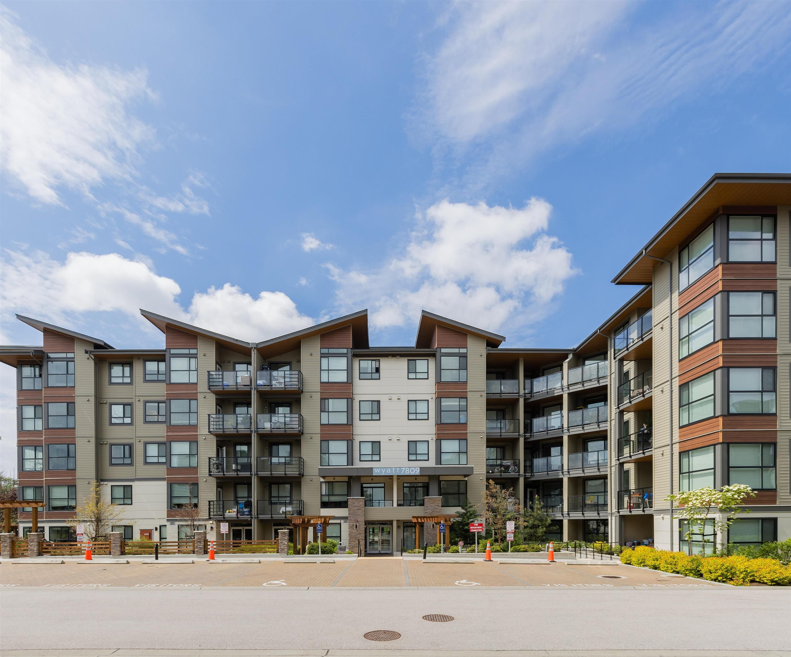 Main Photo: 113 7809 209 Street in Langley: Willoughby Heights Condo for sale in "THE WYATT" : MLS®# R2799440