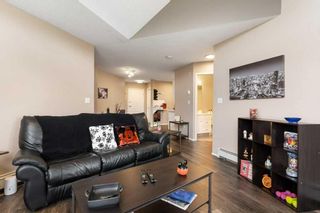 Photo 11: 406 20 Sierra Morena Mews SW in Calgary: Signal Hill Apartment for sale : MLS®# A2127080