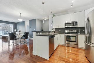 Photo 1: 105 3501 15 Street SW in Calgary: Altadore Apartment for sale : MLS®# A1208403