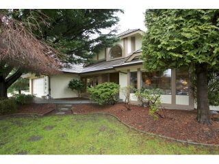 Photo 1: 7537 150A Street in Surrey: East Newton House for sale in "CHIMNEY HILL" : MLS®# R2024417