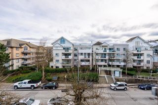 Photo 32: 305 20257 54 Avenue in Langley: Langley City Condo for sale in "Oxford Court" : MLS®# R2760120