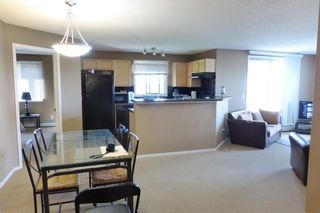 Photo 5: 2101 8 BRIDLECREST Drive SW in Calgary: Bridlewood Condo for sale : MLS®# C4113110