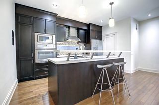 Photo 10: 703 5A Street NW in Calgary: Sunnyside Semi Detached (Half Duplex) for sale : MLS®# A1245061