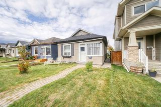 Main Photo: 210 20 Avenue NW in Calgary: Tuxedo Park Detached for sale : MLS®# A2084355