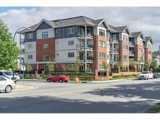 Photo 1: 403 2268 Shaughnessy Street in Port Coquitlam: Central Pt Coquitlam Condo for sale : MLS®# R2270479