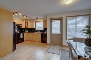 Photo 7: 912 89 Street SW in Calgary: West Springs Semi Detached for sale