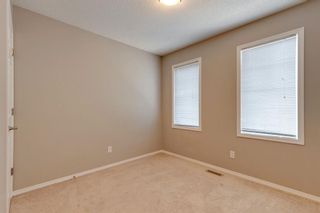 Photo 21: 960 Windsong Drive SW: Airdrie Row/Townhouse for sale : MLS®# A2068399