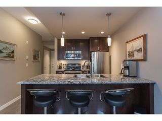 Photo 4: 315 2238 WHATCOM Road in Abbotsford: Abbotsford East Condo for sale in "WATERLEAF" : MLS®# R2165802