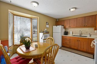 Photo 3: 15 1845 Lysander Crescent SE in Calgary: Ogden Row/Townhouse for sale : MLS®# A1093994