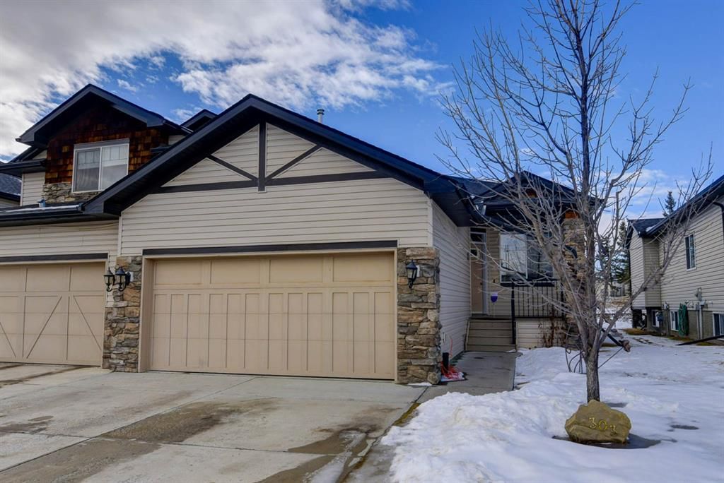 Main Photo: 303 Crystal Green Rise: Okotoks Semi Detached for sale : MLS®# A1184639