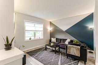 Photo 5: 27 Wolf Willow Boulevard SE in Calgary: C-281 Semi Detached for sale : MLS®# A1255229
