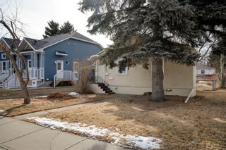 Photo 3: 239 22 Avenue NW in Calgary: Tuxedo Park Detached for sale : MLS®# A1195862