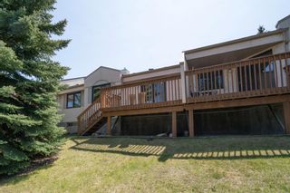Photo 39: 21 Sandarac Circle NW in Calgary: Sandstone Valley Row/Townhouse for sale : MLS®# A2048786
