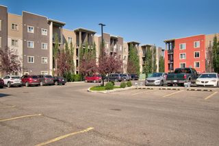 Photo 2: 4403 403 Mackenzie Way SW: Airdrie Apartment for sale : MLS®# A1254338