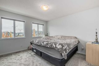 Photo 18: 176 Lucas Boulevard NW in Calgary: Livingston Row/Townhouse for sale : MLS®# A2087491