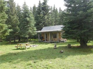Photo 1: 2 miles west of Dartique Hall in COCHRANE: Rural Rocky View MD Rural Land for sale : MLS®# C3545361
