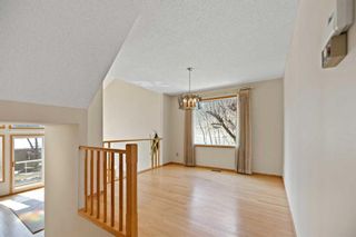Photo 12: 28 Stradwick Way SW in Calgary: Strathcona Park Detached for sale : MLS®# A2124597