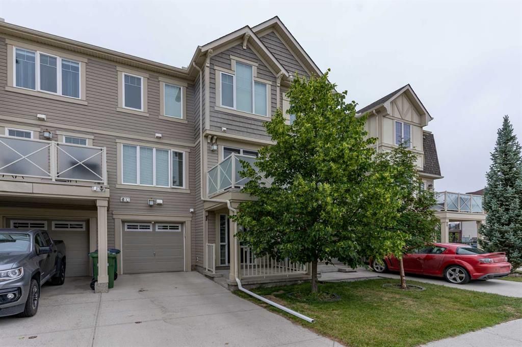 Main Photo: 328 Windstone Gardens SW: Airdrie Row/Townhouse for sale : MLS®# A2057883