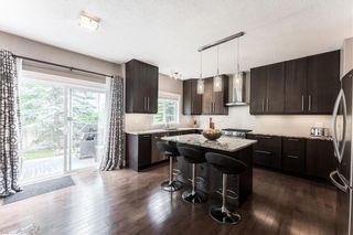 Photo 16: 25 39 STRATHLEA Common SW in Calgary: Strathcona Park Semi Detached for sale : MLS®# C4305635