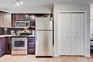 Photo 4: 2413 60 Panatella Street NW in Calgary: Panorama Hills Apartment for sale : MLS®# A2045359