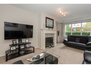 Photo 4: 101 13860 70 Avenue in Surrey: East Newton Condo for sale in "CHELSEA GARDENS" : MLS®# R2134953