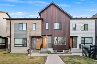 Photo 1: 604 Redstone Crescent NE in Calgary: Redstone Row/Townhouse for sale : MLS®# A2093588