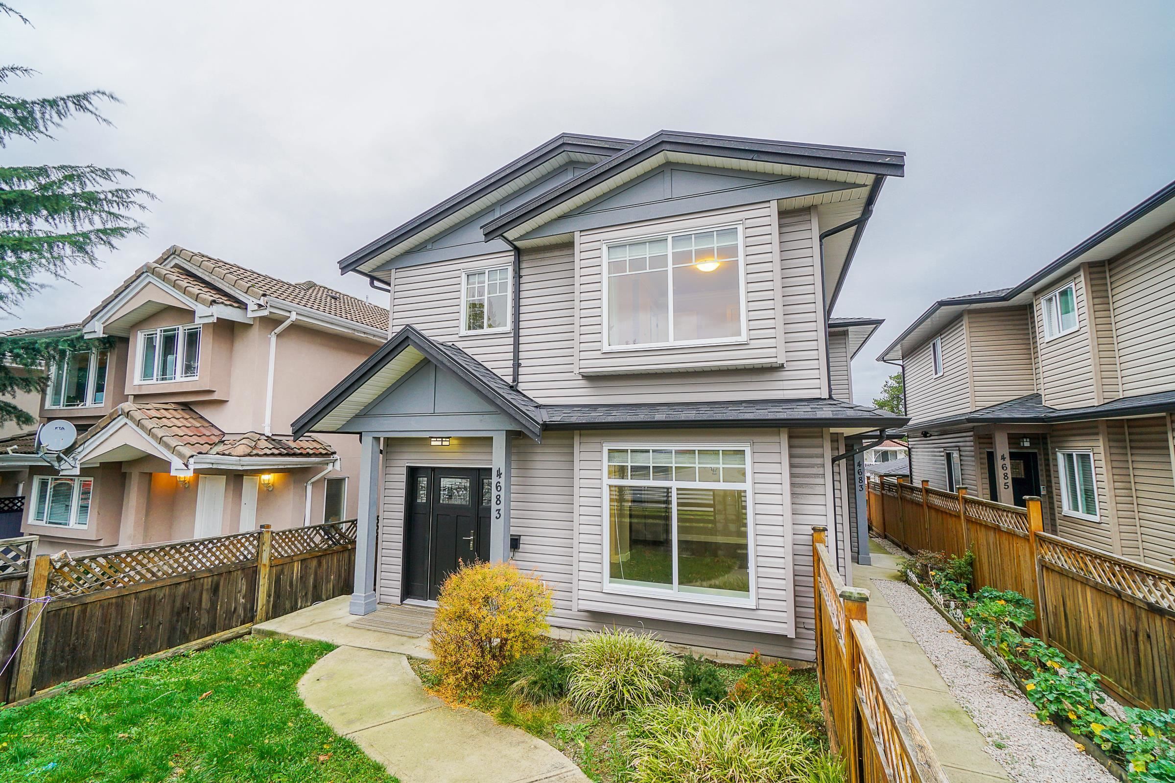 Main Photo: 1 4683 CANADA WAY in Burnaby: Central BN 1/2 Duplex for sale (Burnaby North)  : MLS®# R2636881