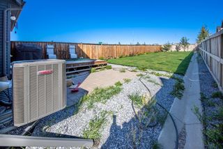 Photo 3: 141 Panatella Way NW in Calgary: Panorama Hills Semi Detached (Half Duplex) for sale : MLS®# A1255584