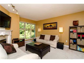 Photo 3: 29 65 FOXWOOD Drive in Port Moody: Heritage Mountain Townhouse for sale in "FOREST HILL" : MLS®# V974038