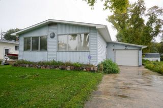 Photo 1: 536 6th St NW in Portage la Prairie: House for sale : MLS®# 202223153