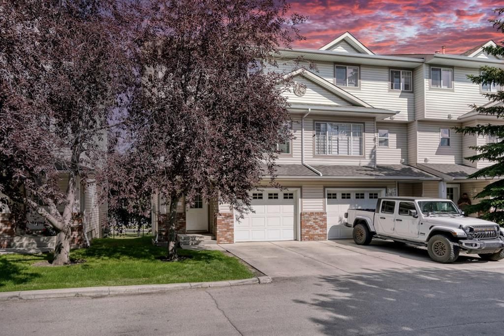 Main Photo: 112 Country Hills Cove NW in Calgary: Country Hills Row/Townhouse for sale : MLS®# A1252598
