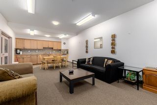 Photo 36: 210 248 Sunterra Ridge Place: Cochrane Apartment for sale : MLS®# A2053195